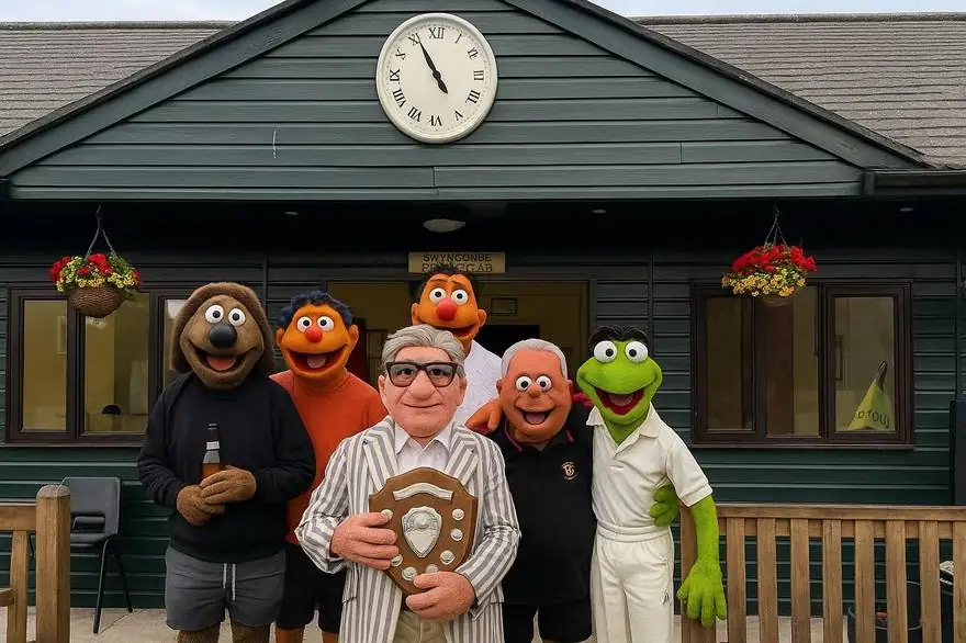 The President's Men: a team of puppet characters posing with the shield outside the pavilion