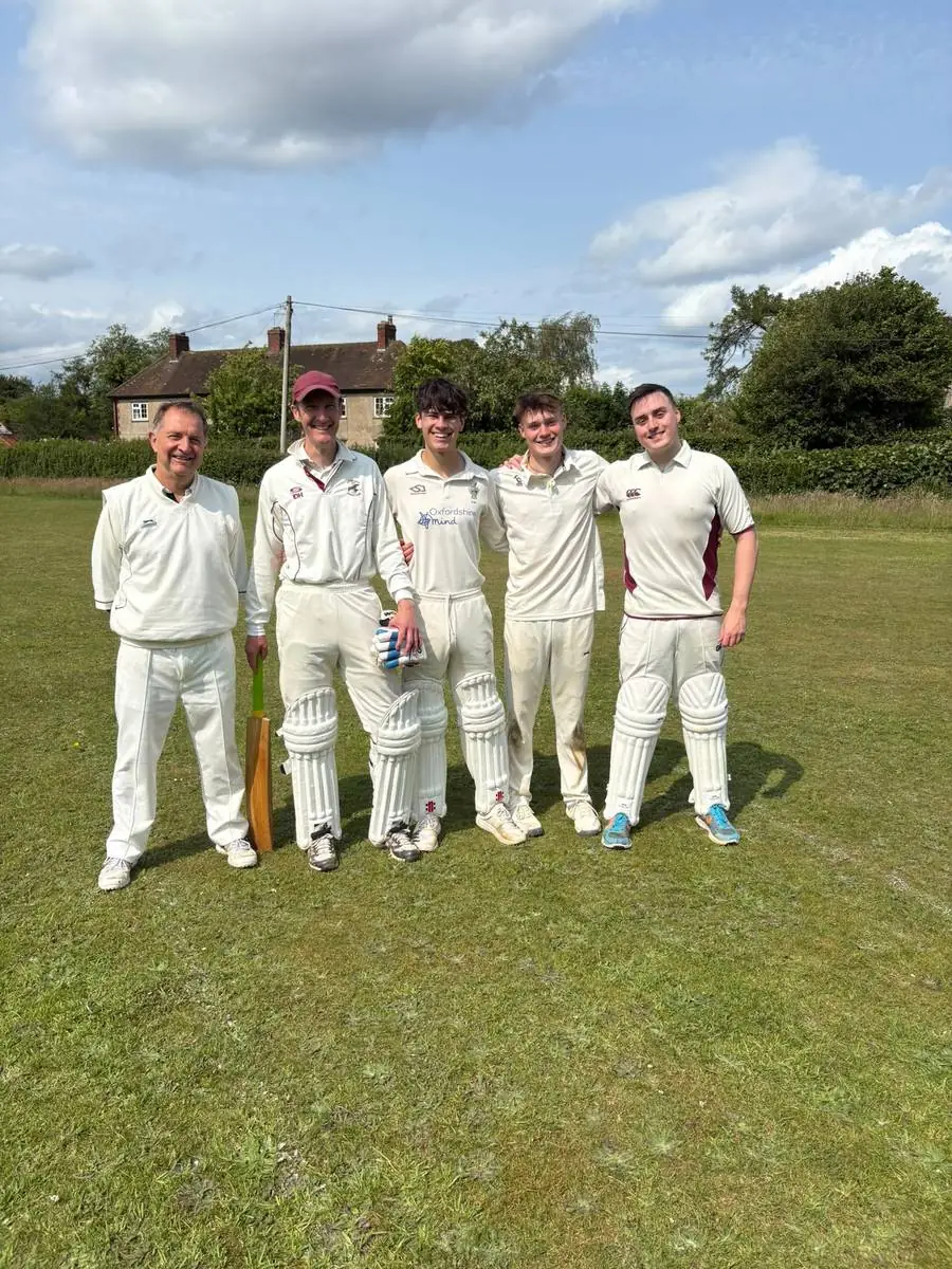 Five Swyncombe players lined up in their whites at the 6-a-side extravaganza